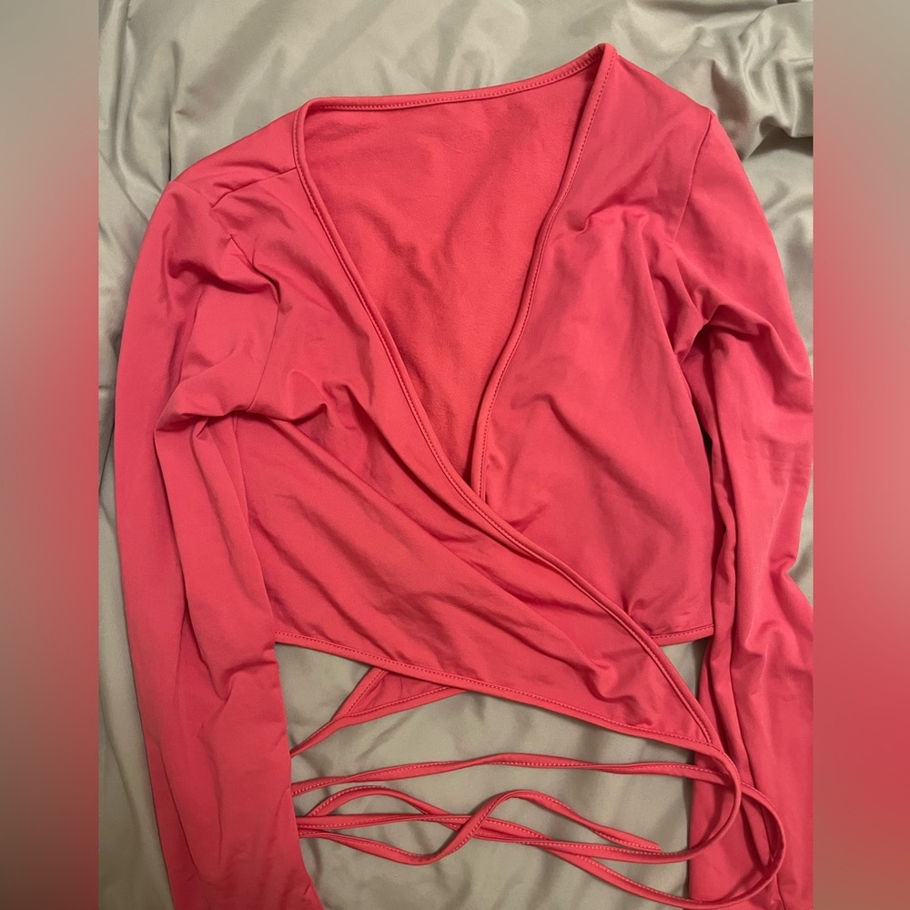 never worn long sleeve pink wrap tie top
